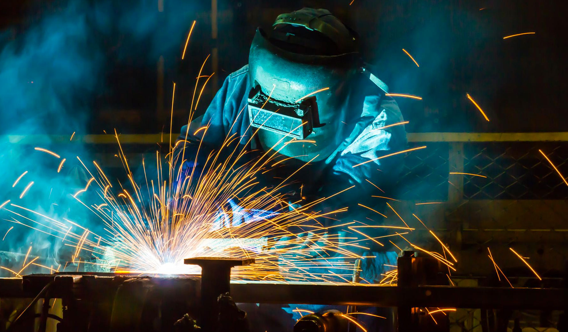 Welding at a metal engineering from freepik